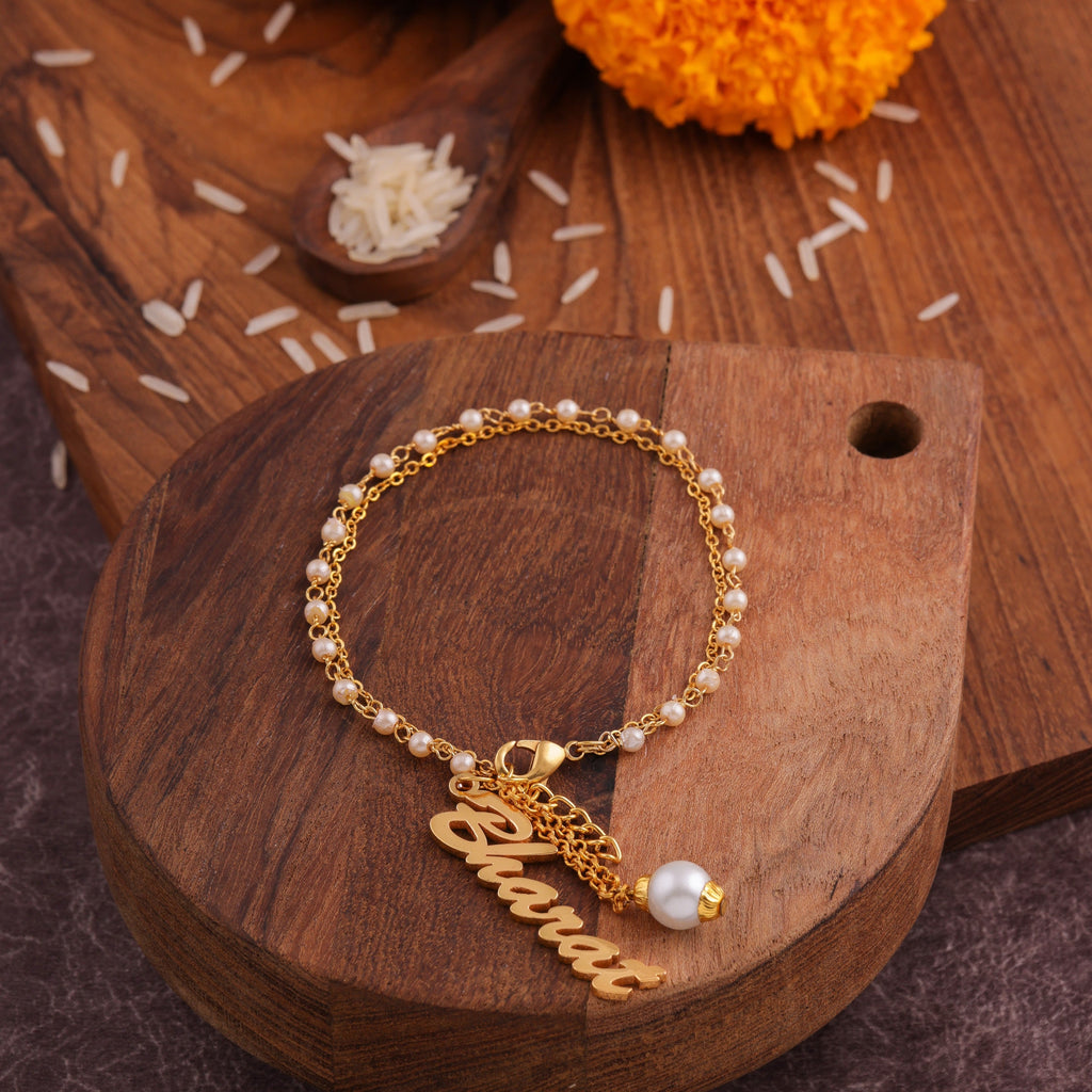 Customized Rakhi With White Pearl Beads