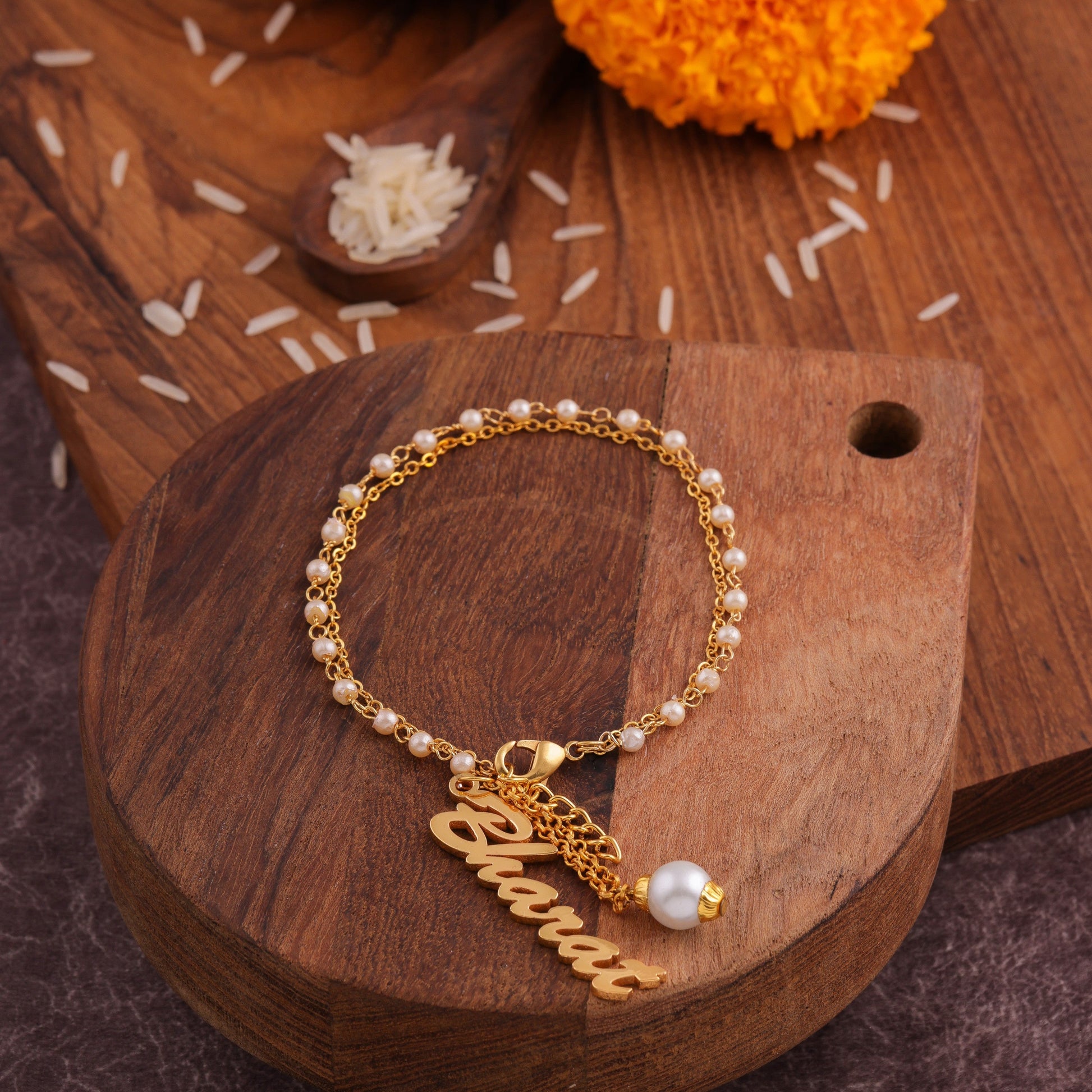 Customized Rakhi With White Pearl Beads